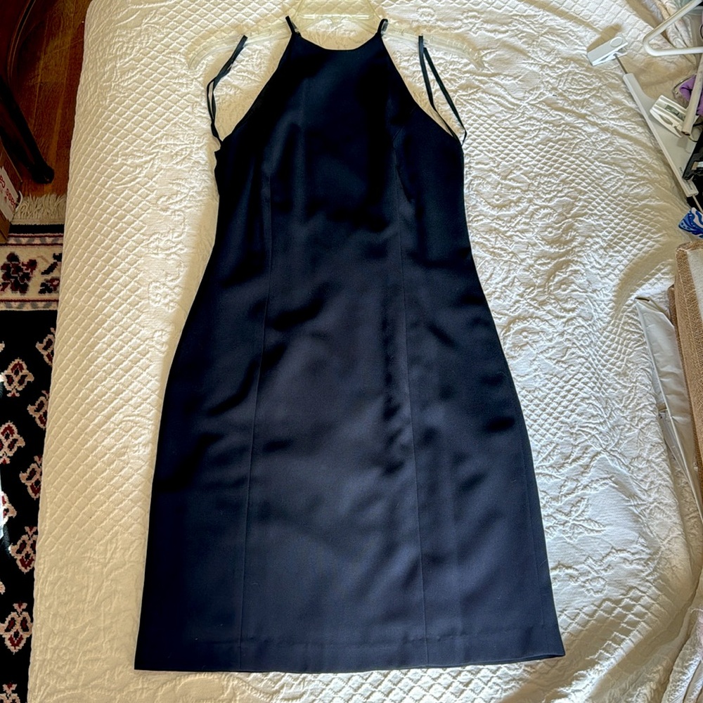 I.C. Design Black Halter Mini Dress. Size 4 with Back Cutout. Figure flattering.